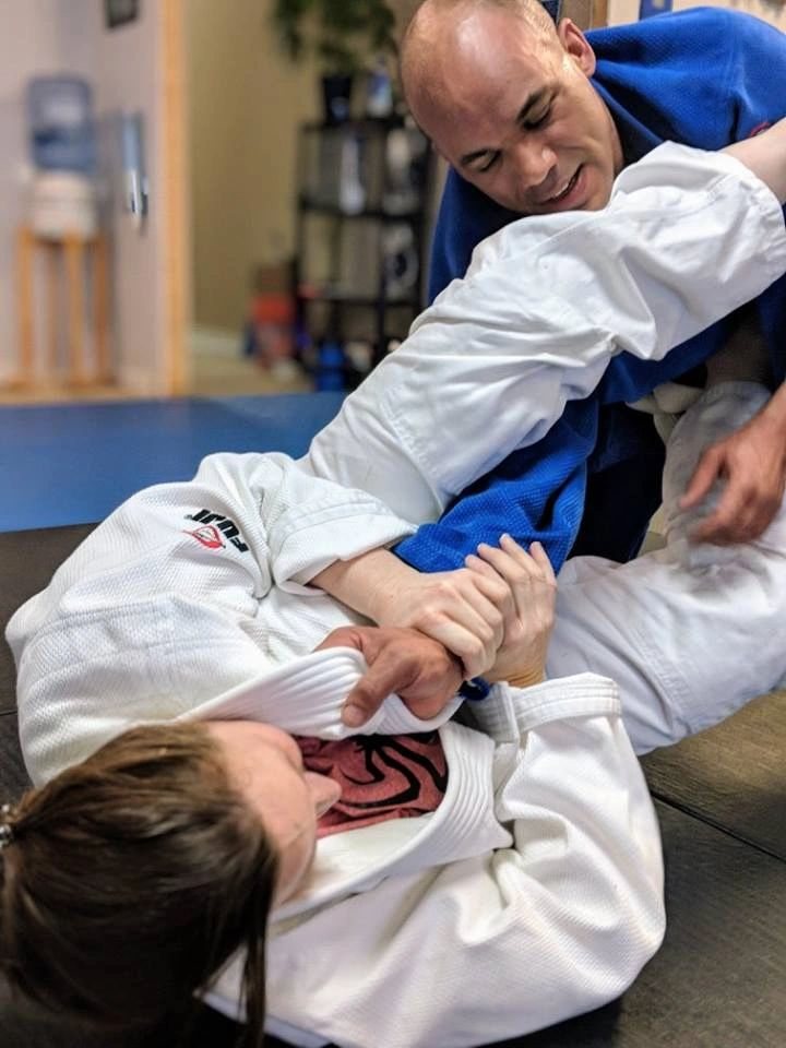 Jiu-jitsu ground technique being taught at Snyder Dojo