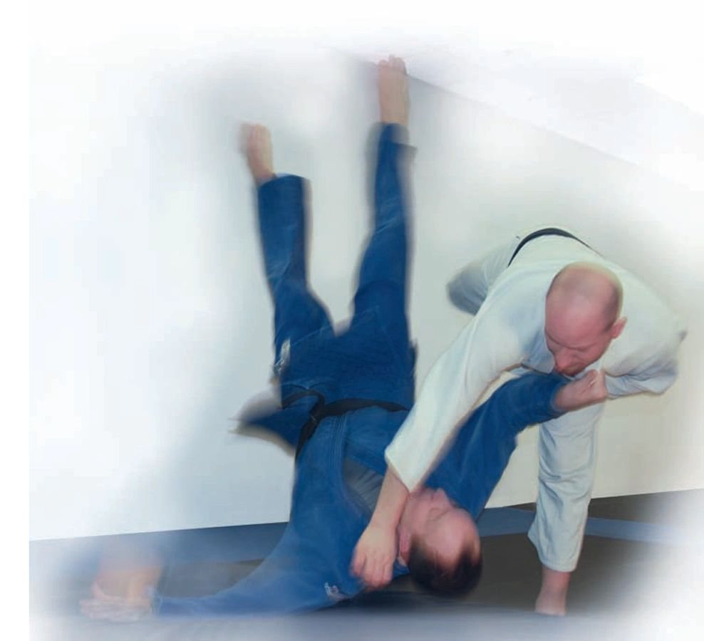 Judo throw in progress at Snyder Dojo